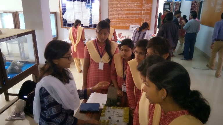 M.Sc. students explaining models in the science exhibition